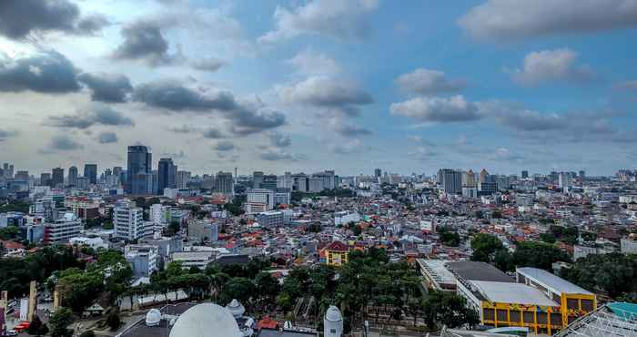 Nearby View and Attractions Comfy Studio Room Apartment at Menteng Park By Travelio