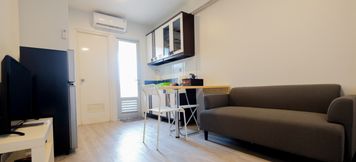 Common Space 4 2BR Newly Renovated Apartment Gading Nias Residence By Travelio