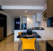 Common Space 2 1BR Elegant Branz BSD Apartment near AEON Mall By Travelio