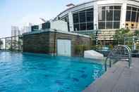 Swimming Pool 3BR Luxurious Apartment at FX Residence Sudirman By Travelio