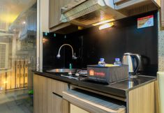 Bedroom 6 Warm 2BR Green Palace Apartment By Travelio
