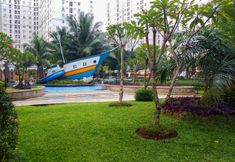 Common Space 3 Warm 2BR Green Palace Apartment By Travelio