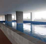 Swimming Pool 2 Studio Room Simple at Poris 88 Apartment By Travelio