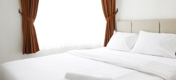 Lobby 2 2BR Cozy Apartment at Newton Residence By Travelio