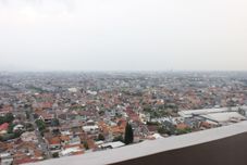 Exterior 2BR Cozy Apartment at Newton Residence By Travelio