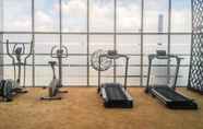 Fitness Center 5 Modern 1BR at The Oasis Apartment By Travelio