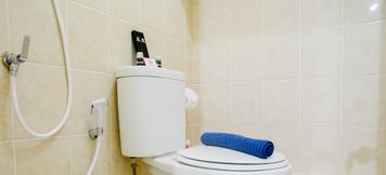 In-room Bathroom 5 2BR Comfy Green Bay Pluit Apartment By Travelio
