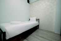 Bedroom 2BR Homey at Gading Nias Residences Apartment By Travelio