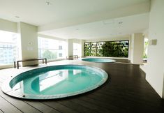 Swimming Pool 2 Best Studio Room Apartment at Capitol Park Residence By Travelio