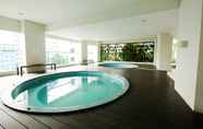 Swimming Pool 2 Best Studio Room Apartment at Capitol Park Residence By Travelio