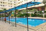 Swimming Pool Simply 2BR Kebagusan City Apartment By Travelio