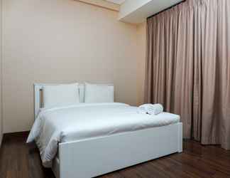 Kamar Tidur 2 Homey 1BR Puri Orchard Apartment By Travelio