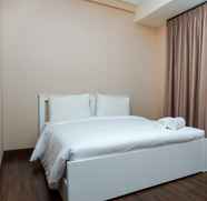 Bedroom 4 Homey 1BR Puri Orchard Apartment By Travelio