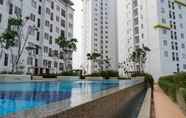 Swimming Pool 4 3BR Spacious and Clean at Bassura Apartment By Travelio