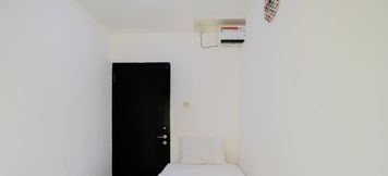 寝室 5 2BR Homey Apartment at Paragon Village By Travelio