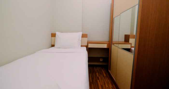 ห้องนอน 1BR Homey at Menteng Square Apartment By Travelio