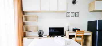 Bedroom 4 Studio City View at Springwood Residence By Travelio