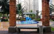 Kolam Renang 3 2BR Homey Green Palace Kalibata Apartment By Travelio