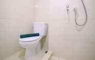 In-room Bathroom 5 Cozy Studio Apartment at Springlake Summarecon Bekasi By Travelio