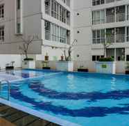 Kolam Renang 3 2BR Best Price at Taman Melati Margonda Apartment By Travelio