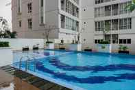 Swimming Pool 2BR Best Price at Taman Melati Margonda Apartment By Travelio