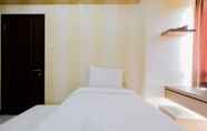Bedroom 7 1BR Comfy Scientia Residences By Travelio