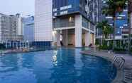 Swimming Pool 4 Tranquil 1BR Apartment at GP Plaza By Travelio