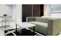 Lobby Studio Azalea Suites Cikarang Apartment with Bathtub By Travelio