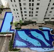 Swimming Pool 2 Best 2BR Bassura City Apartment By Travelio