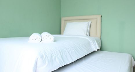 Bilik Tidur 2 2BR Modern Apartment at Newton Residence By Travelio