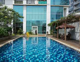 Swimming Pool 2 3BR Spacious at Ambassade Residences Apartment near Kuningan By Travelio