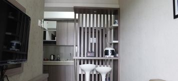 Bedroom 2 2BR Modern Apartment at Galeri Ciumbuleuit 2 near UNPAR By Travelio