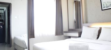 Bedroom 5 2BR Modern Apartment at Galeri Ciumbuleuit 2 near UNPAR By Travelio