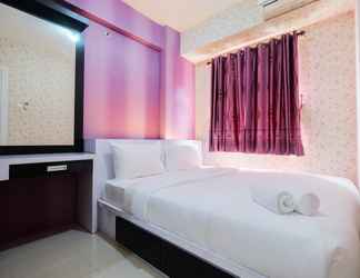 Bedroom 2 Comfy 1BR Green Pramuka Apartment By Travelio