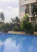 SWIMMING_POOL Spacious Studio Margonda Residence 3 Apartment By Travelio