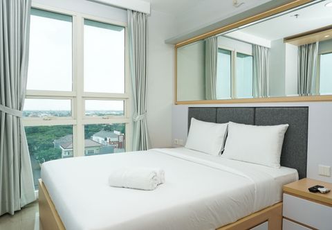 Bedroom Comfy 2BR CitraLake Suites Apartment By Travelio