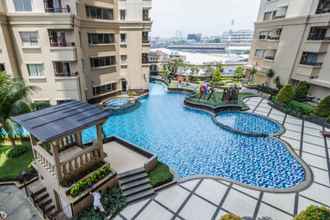 Swimming Pool 4 2BR Comfortable at Sky Terrace Apartment By Travelio