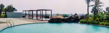 Swimming Pool 2 Studio Highest Value at Grand Kamala Lagoon Apartment By Travelio