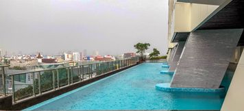Swimming Pool 2 Simply Furnished Studio Apartment at Menteng Park By Travelio