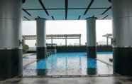 Swimming Pool 2 Comfy 2BR Apartment next to Thamrin City at Cosmo Terrace By Travelio