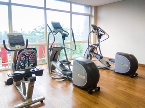 Fitness Center 4 Homey and Comfy Studio Apartment at Tifolia By Travelio