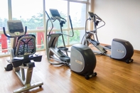 Fitness Center Homey and Comfy Studio Apartment at Tifolia By Travelio