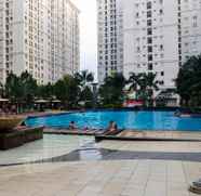 Swimming Pool 5 2BR Contemporary at Green Palace Kalibata Apartment By Travelio