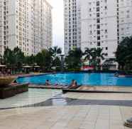 Kolam Renang 5 2BR Contemporary at Green Palace Kalibata Apartment By Travelio