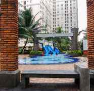 Swimming Pool 3 2BR Contemporary at Green Palace Kalibata Apartment By Travelio