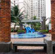 Kolam Renang 3 2BR Contemporary at Green Palace Kalibata Apartment By Travelio