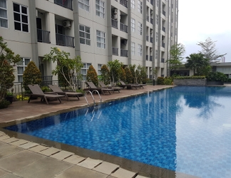 Swimming Pool 2 1BR Cozy Unit Saveria Apartment By Travelio