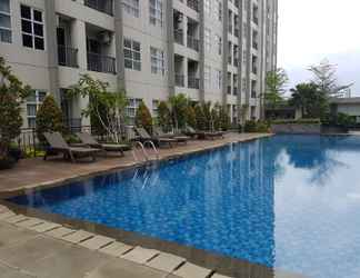 Kolam Renang 2 1BR Cozy Unit Saveria Apartment By Travelio