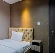 Bedroom 3 Luxury 2BR Apartment at Bintaro Icon By Travelio