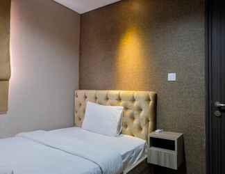 Bedroom 2 Luxury 2BR Apartment at Bintaro Icon By Travelio